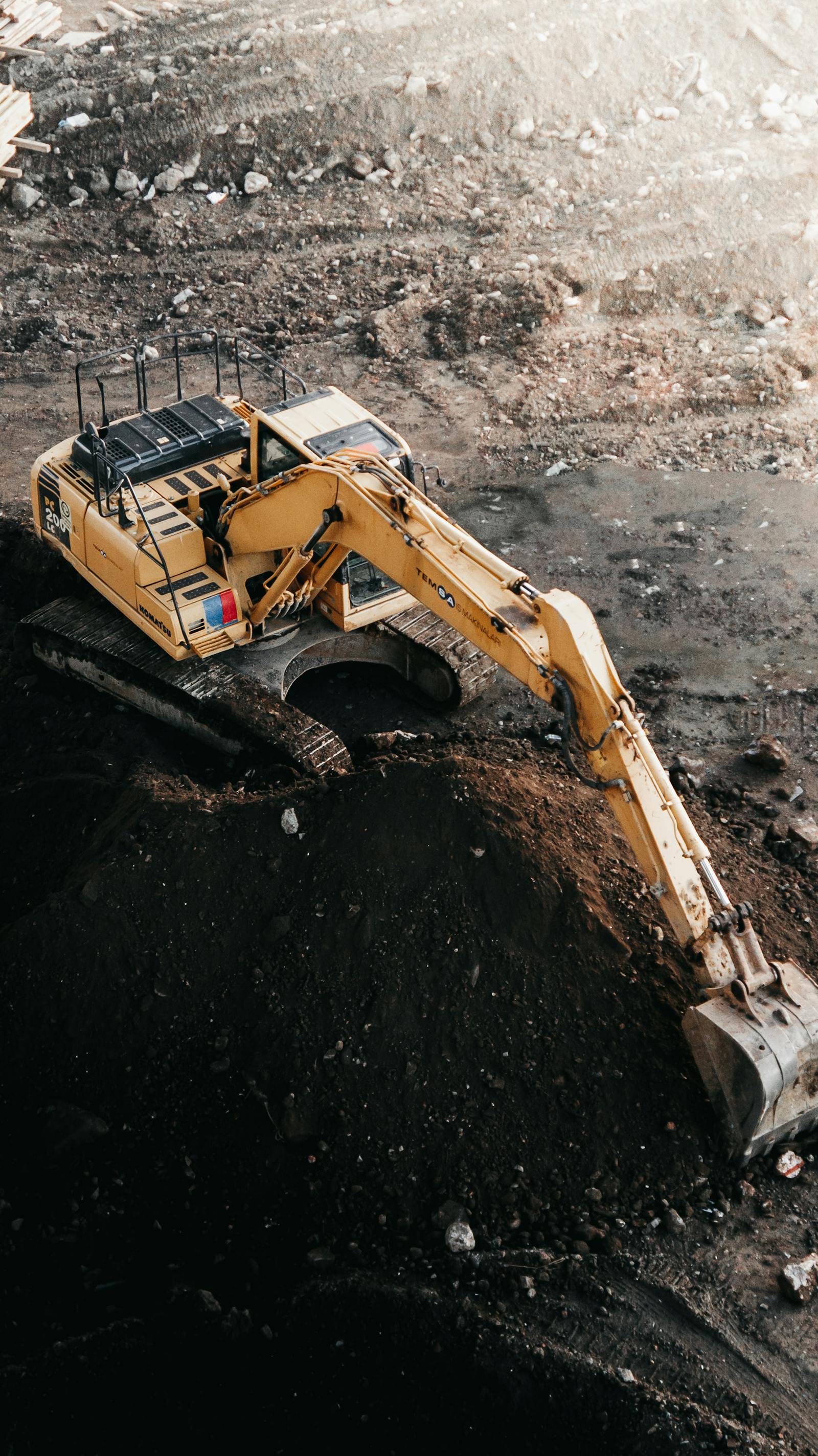 Excavator digging out a site