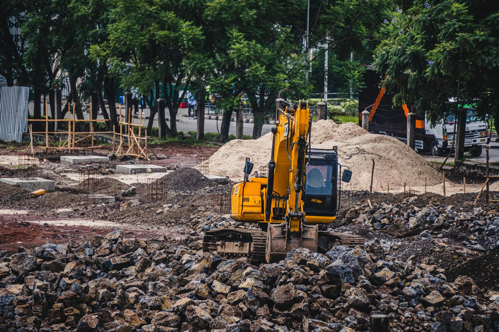 Tracked excavator on a groundworks site